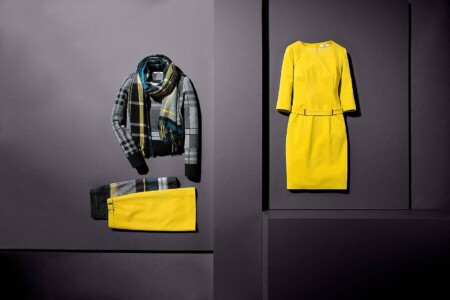 Outfits gelb schwarz als Legeware fotografiert.